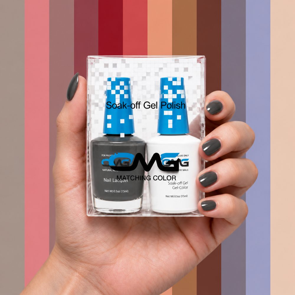 A hand with charcoal gel nails holding an OMG matching soak-off gel and lacquer pack against colour stripes